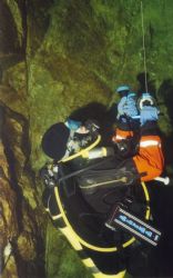 Just reeling, Diver retrieving line at the end of a cave ... by Teppo Lallukka 